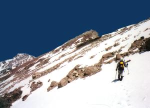 crossing a snowy slope
