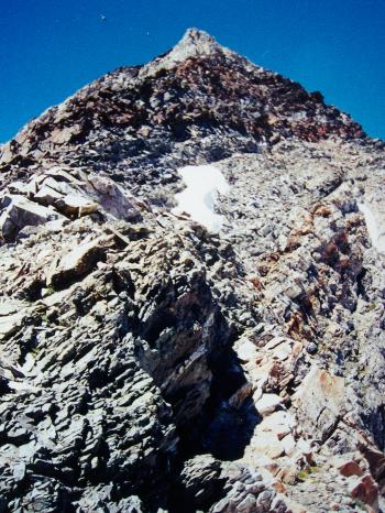 View NW toward summit of Duncan Peak, showing approach ramp, 8/8/99, photo by Rick Baugher.